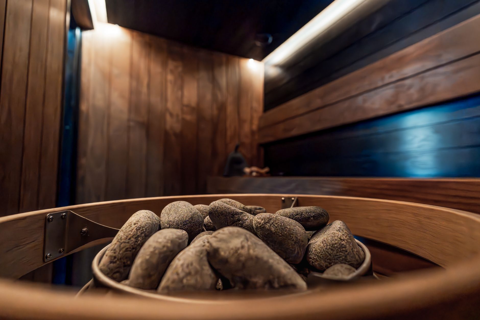Wooden sauna interior representing sauna benefits for athletes UK heat acclimation protocols