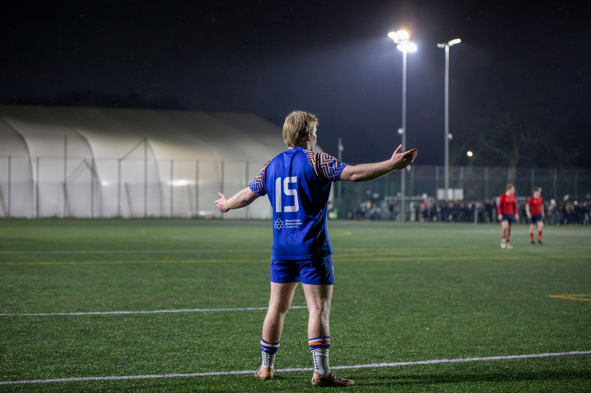 Rugby player using breathwork for athletes protocol during post-match recovery
